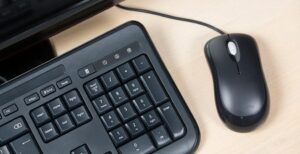 photo of computer keyboard and mouse